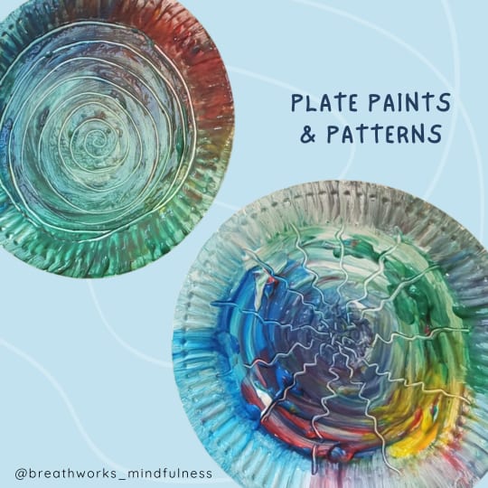 Paper plates with paint patterns on